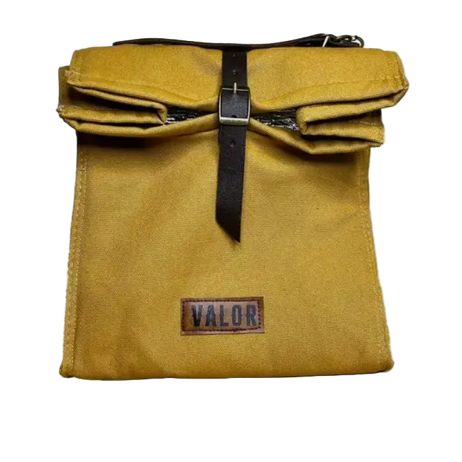 A yellow canvas lunch bag with a black strap and buckle-fastening closure, featuring the brand name 'Valor' on the front.