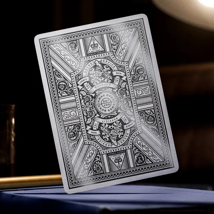 Playing card with intricate design on a dark background