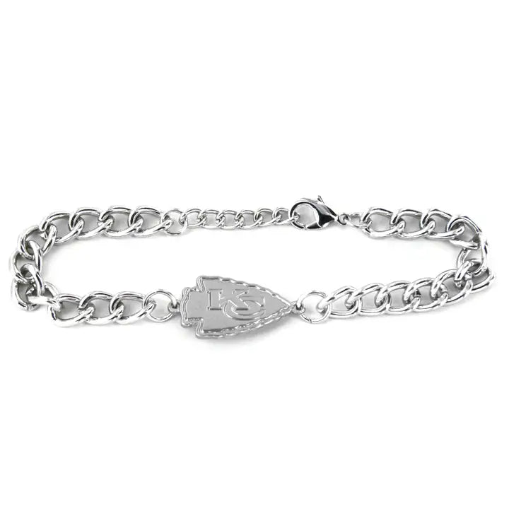 A silver-colored chain link bracelet featuring a Kansas City Chiefs logo charm.