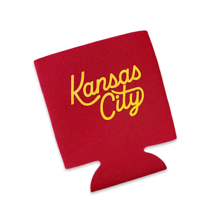 Red can koozie with 'Kansas City' in yellow text on a white background