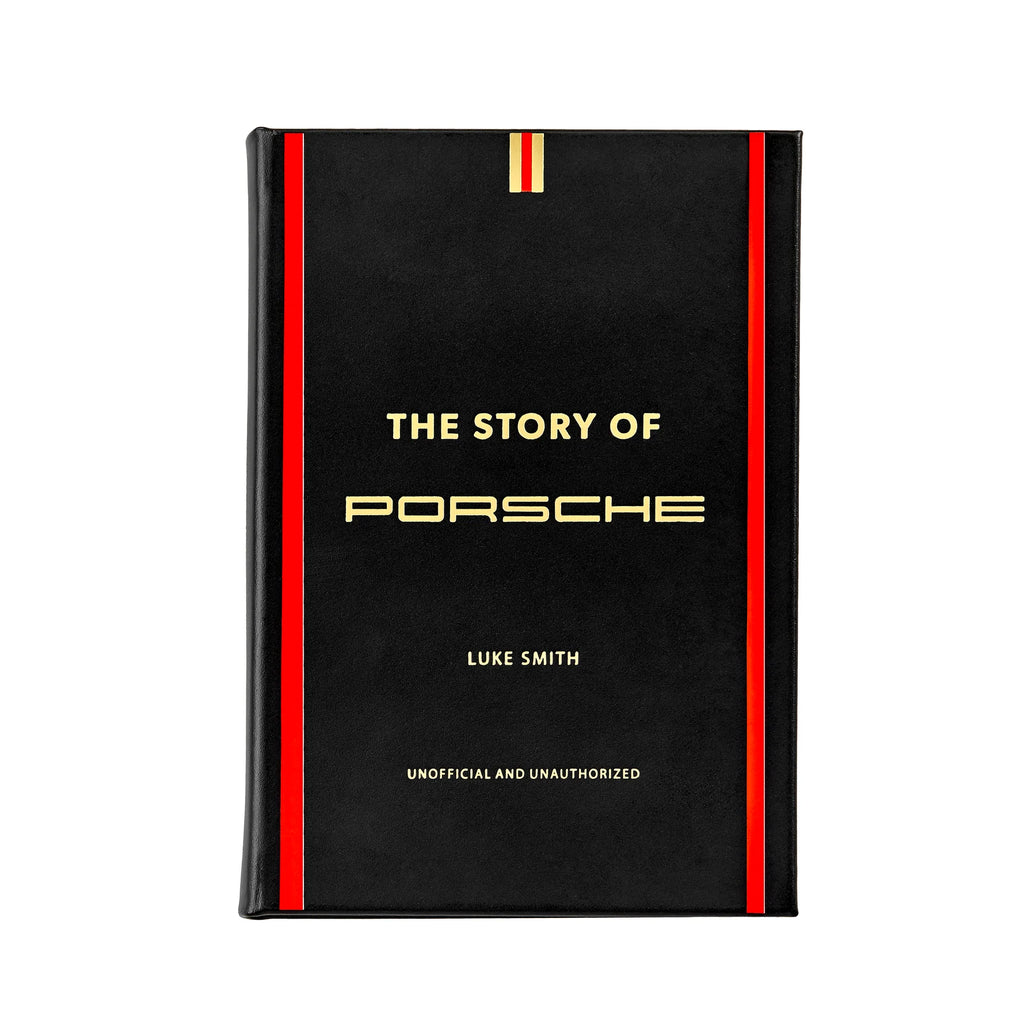 A black book titled 'The Story of Porsche' by Luke Smith, featuring a leather cover with red and white stripes.