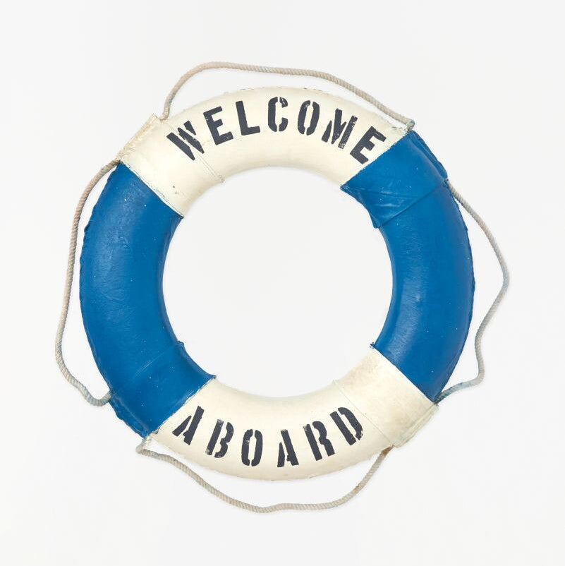 Blue and white life preserver with 'Welcome Aboard' text on a white background