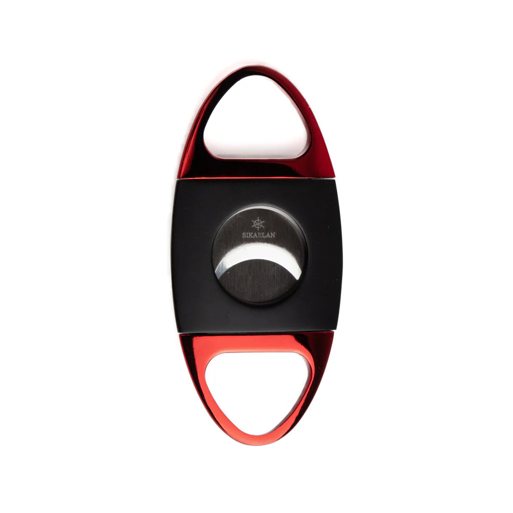 Cigar cutter with red and black design on a white background