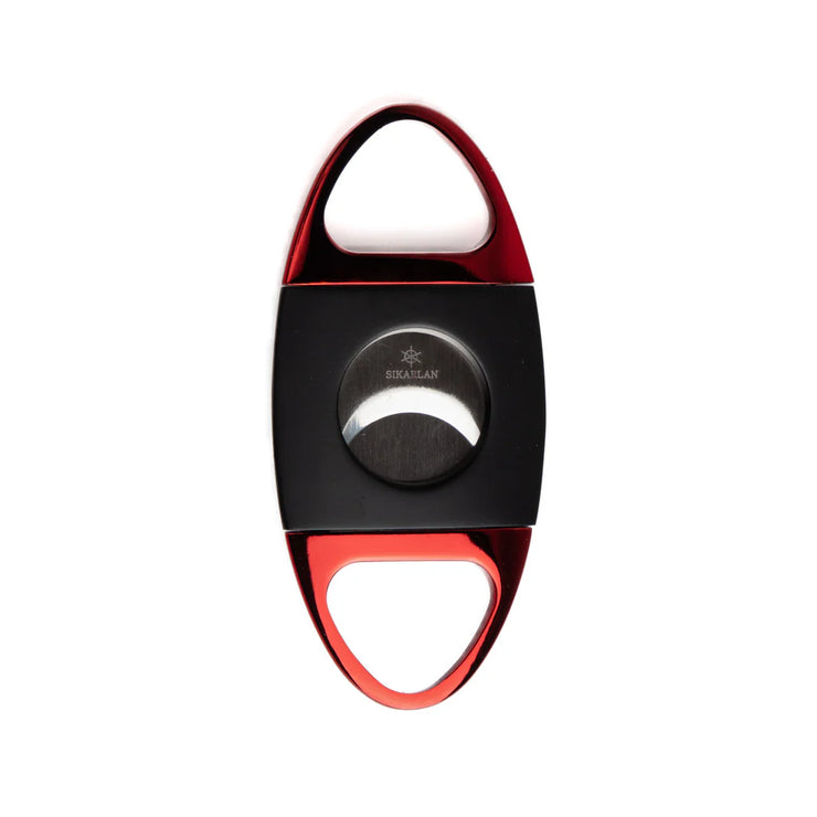Cigar cutter with red and black design on a white background