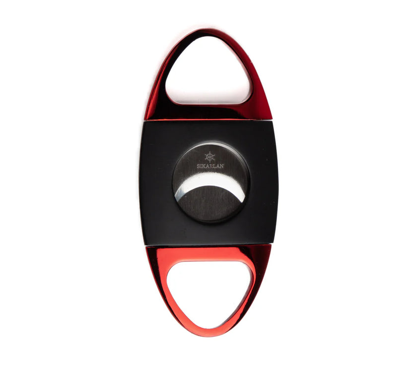 Cigar cutter with red and black design on a white background