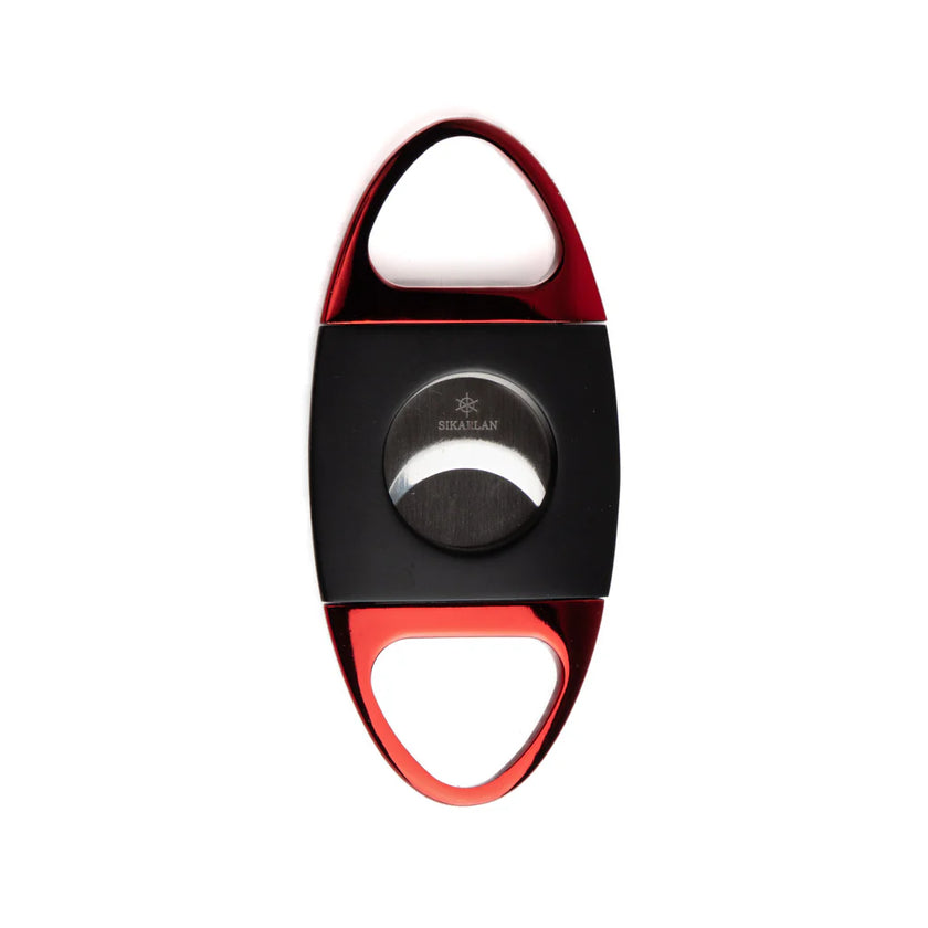 Cigar cutter with red and black design on a white background