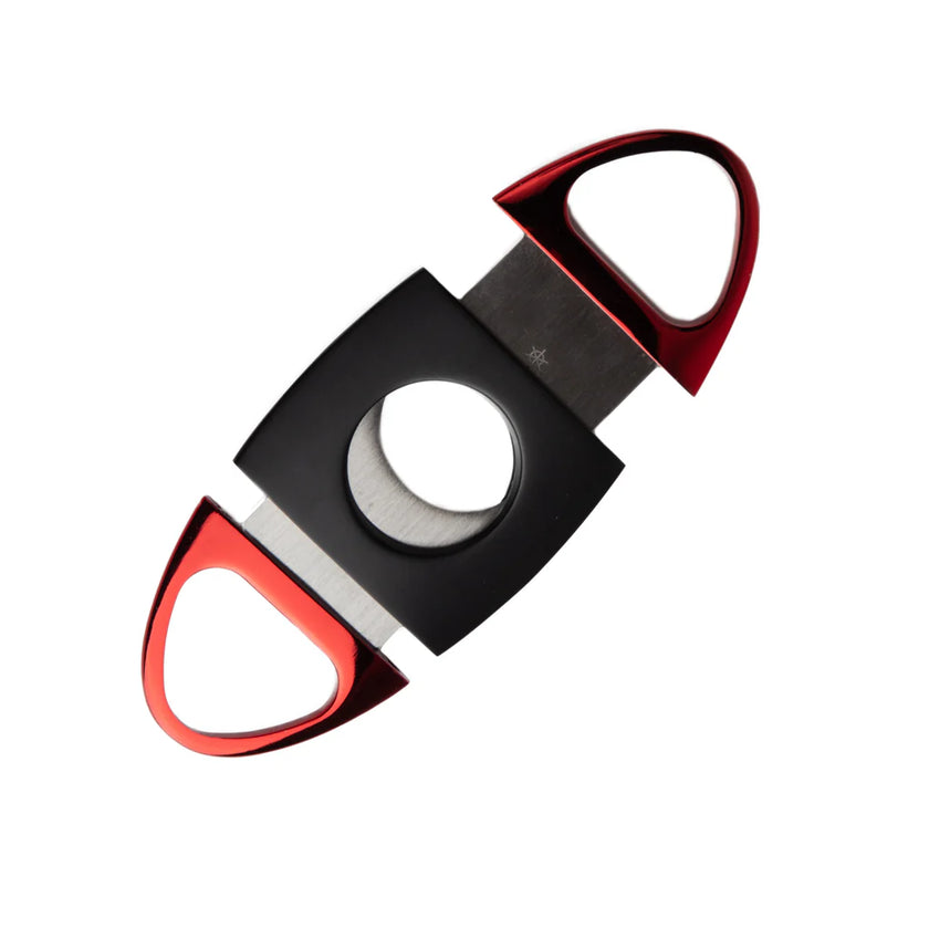 Cigar cutter with red and black design on a white background