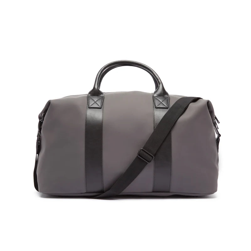 Gray duffel bag with black accents on a white background
