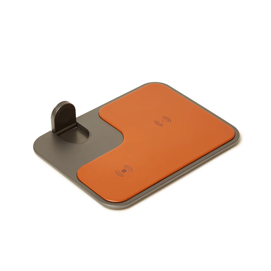 Brown and gray wireless phone charger on a white background