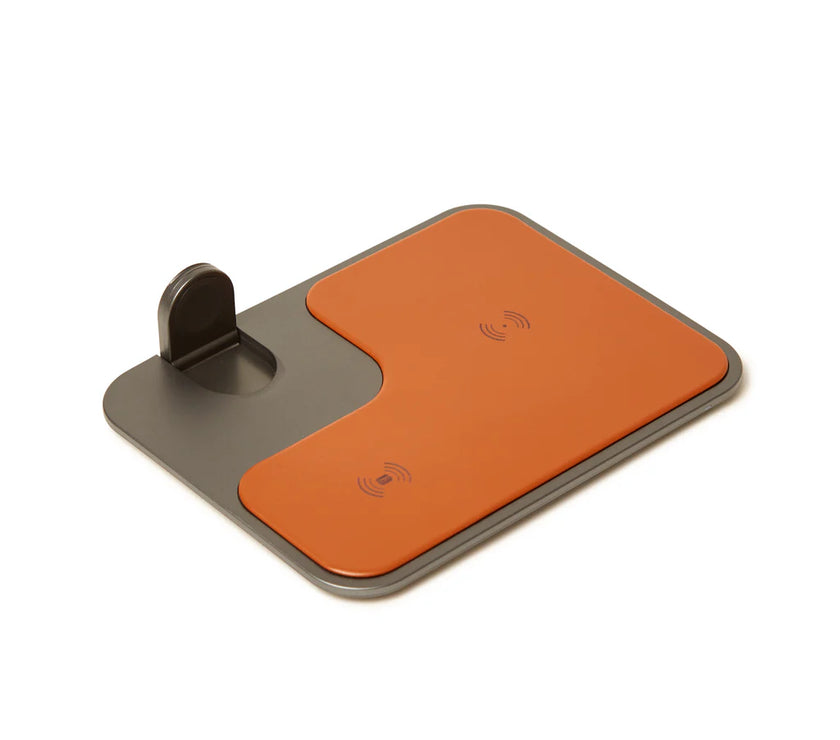Brown and gray wireless phone charger on a white background