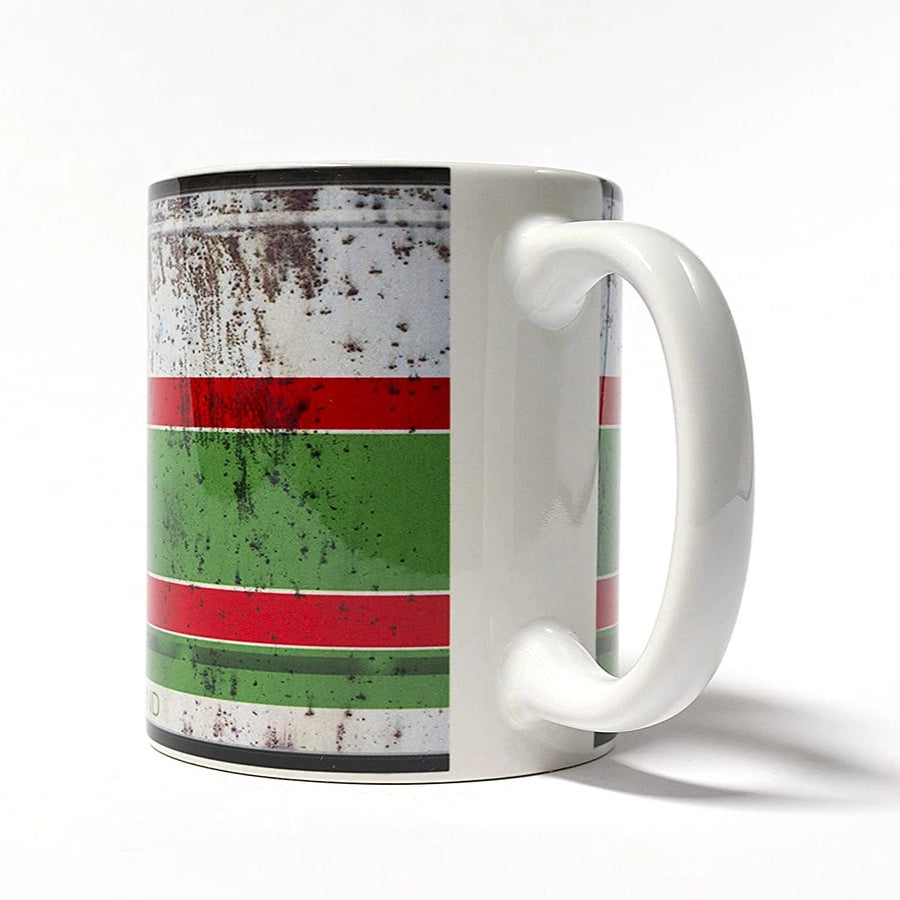 Mug with a design featuring red and green stripes on a white background