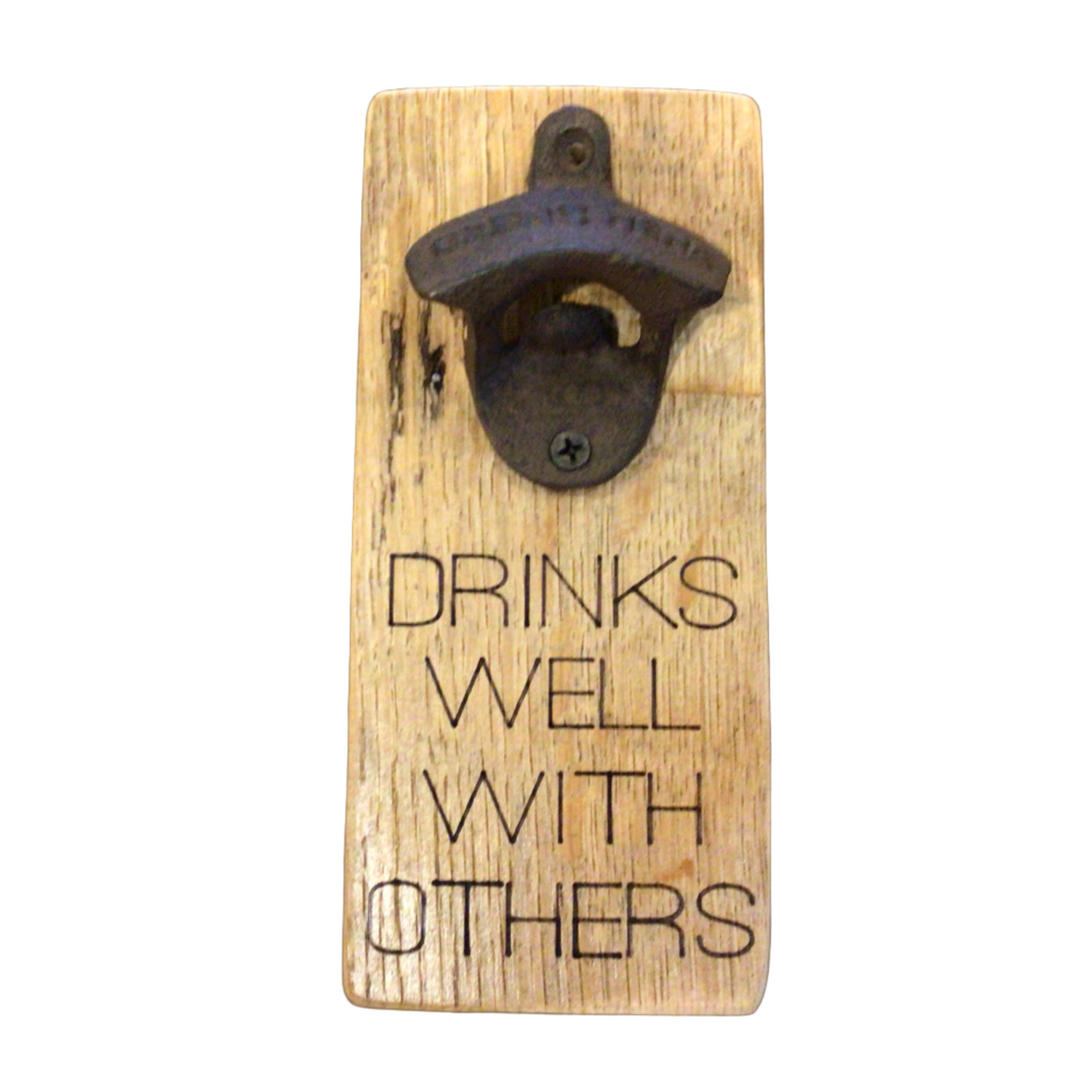 A Barrel Stave Quote Bottle Opener that says "Drinks well with others."
