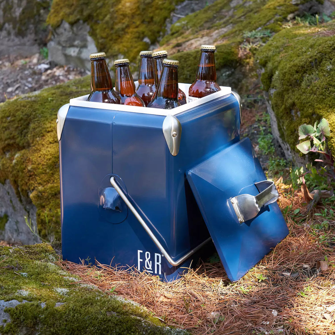 Blue cooler with 'F&R' branding holding six bottles outdoors.