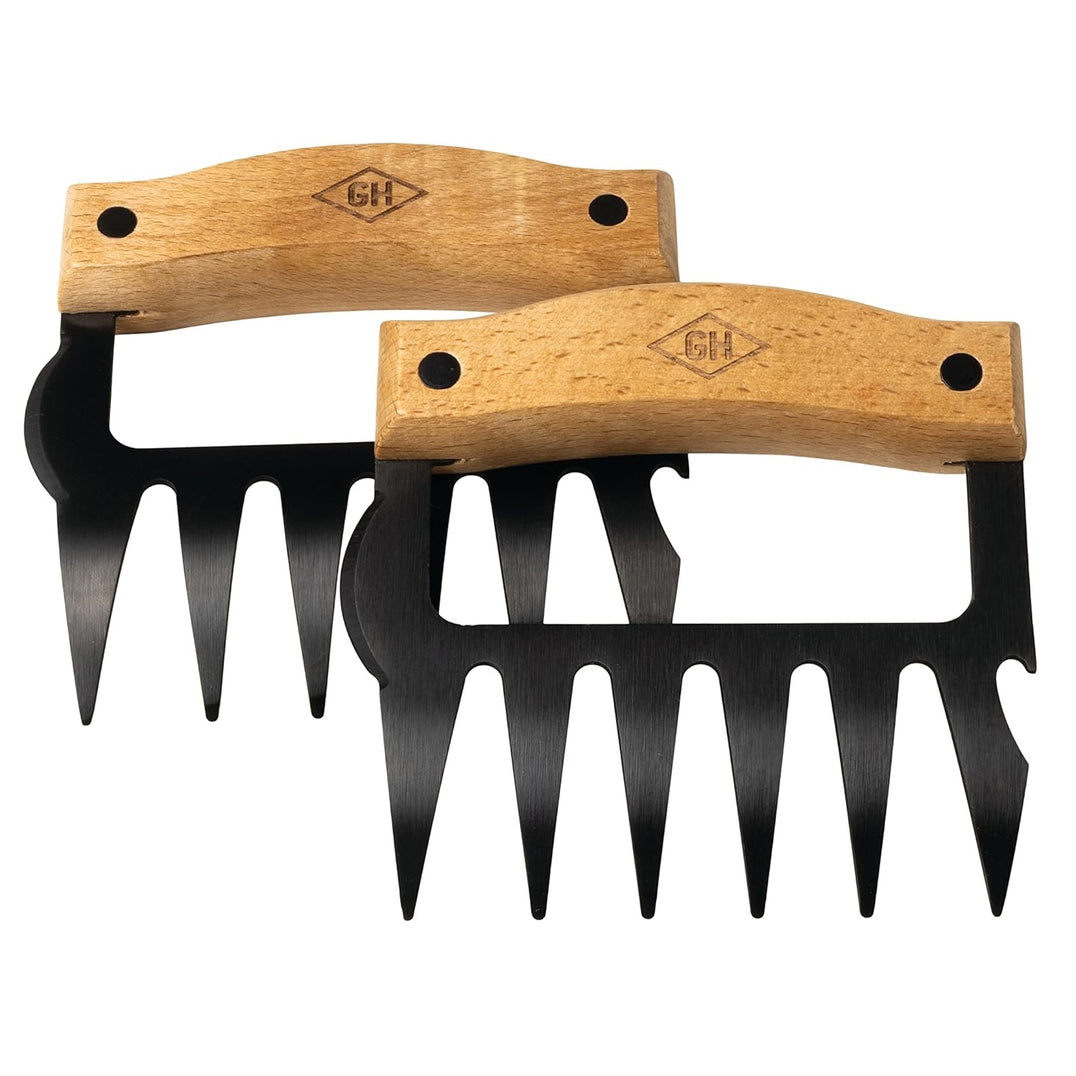 Two wooden-handled meat shredders with black metal teeth on a white background