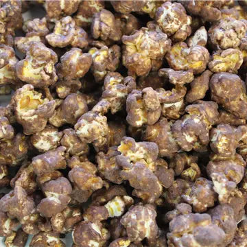 Close-up of caramel popcorn with a brown color.