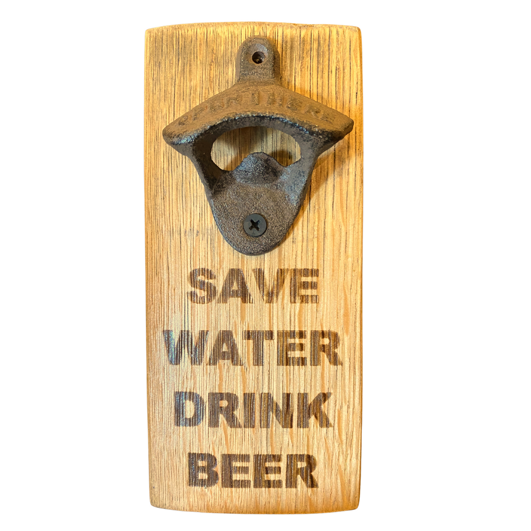 A barrel stave fashioned into a bottle opener with the words "save water drink beer" on it.