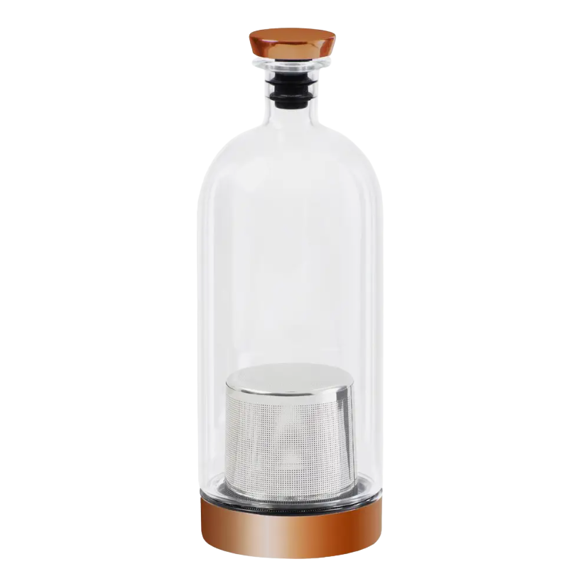 Clear glass bottle with brown cork lid and metal mesh filter on a white background