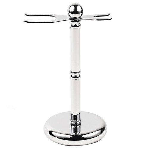 A chrome safety razor and brush stand.