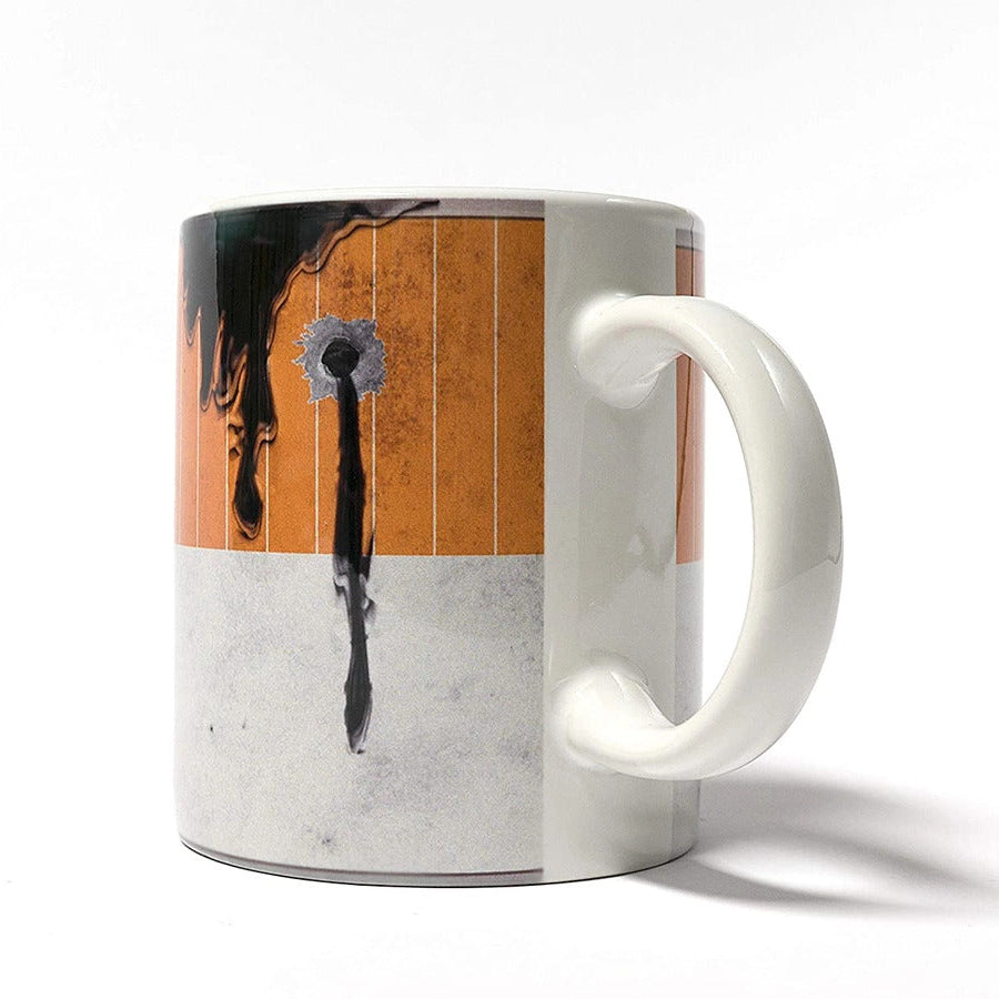 Mug with image of oil leaking out of a can on a white background
