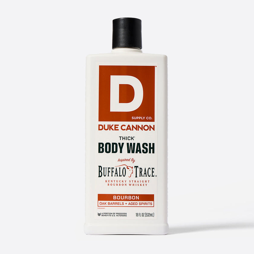 A bottle of Duke Cannon THICK Body Wash with the label indicating it is scented with Buffalo Trace bourbon.