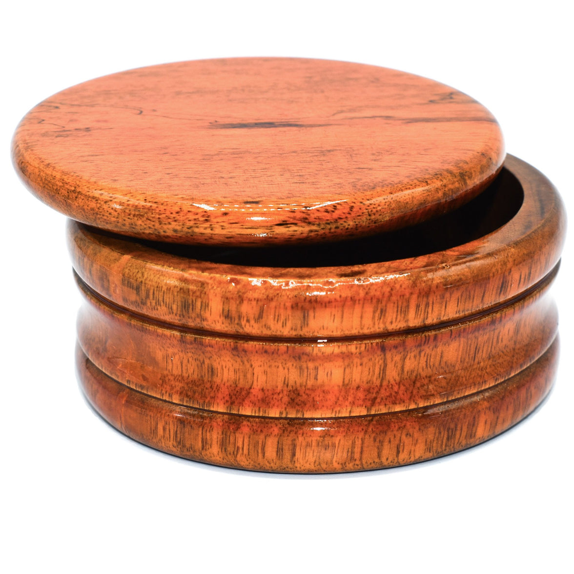 A honey-colored mango wood shave bowl with a lid, displaying the grain of the wood.
