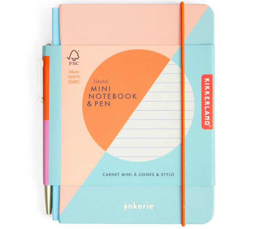 Kikkerland mini notebook and pen set with geometric design on a white background