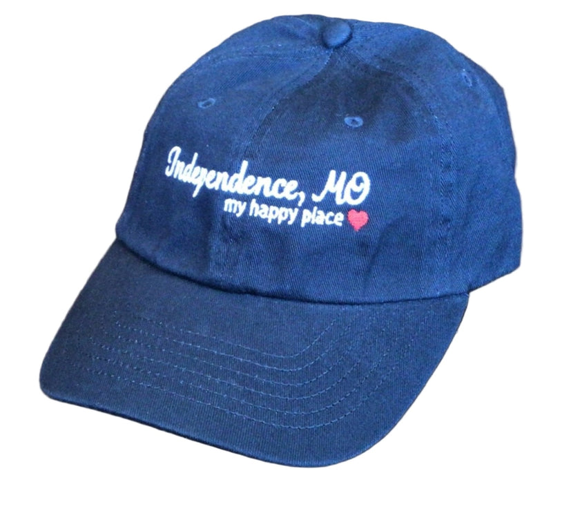 Blue cap with 'Independence, MO my happy place' text on a white background