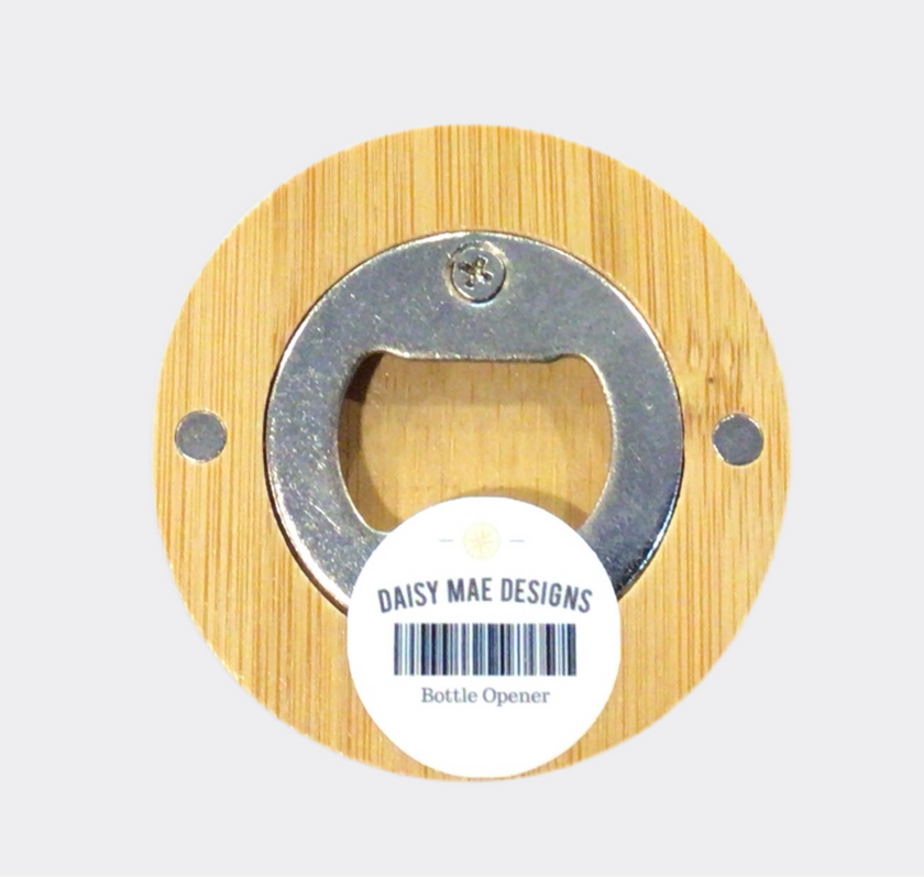 The back of a round bamboo bottle opener with a map of Independence, Missouri, in the center.