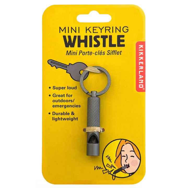 Mini keyring whistle on a yellow Kikkerland packaging