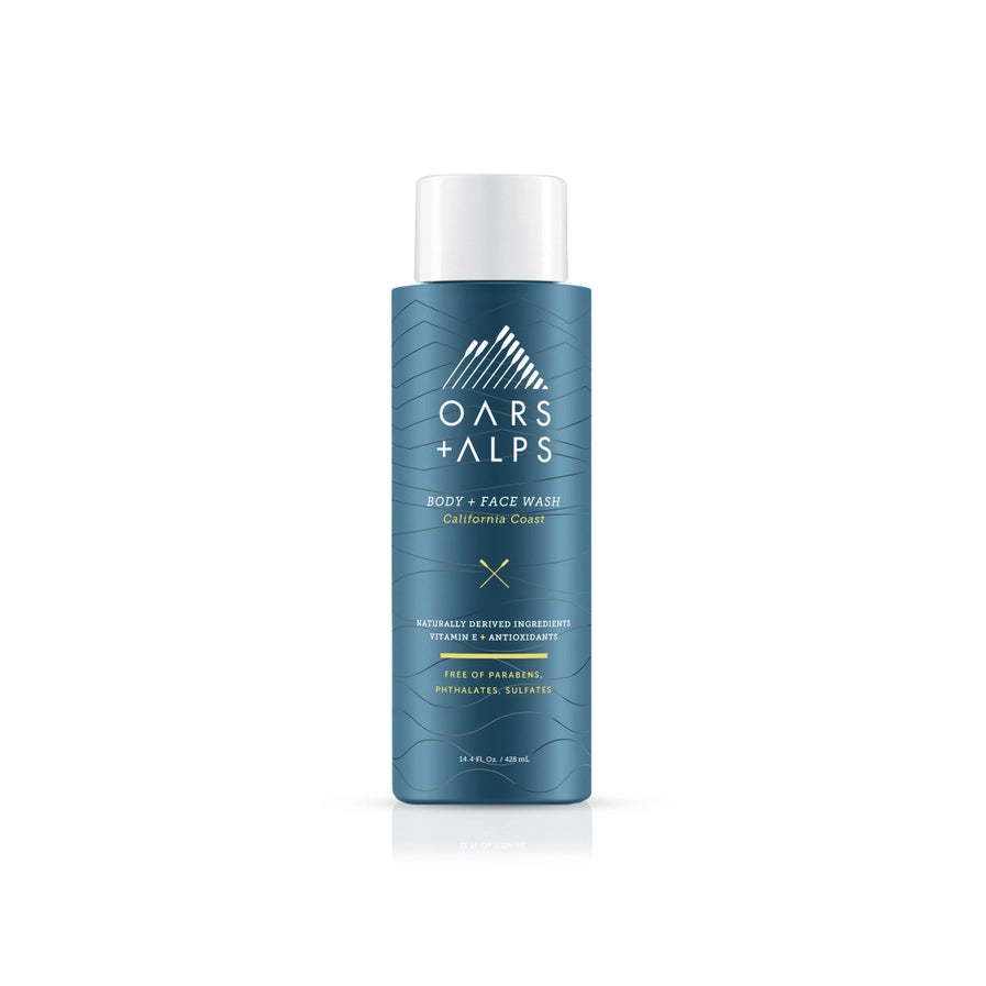 A bottle of Oars + Alps Men's Body Wash - California Coast with a blue label and white cap.
