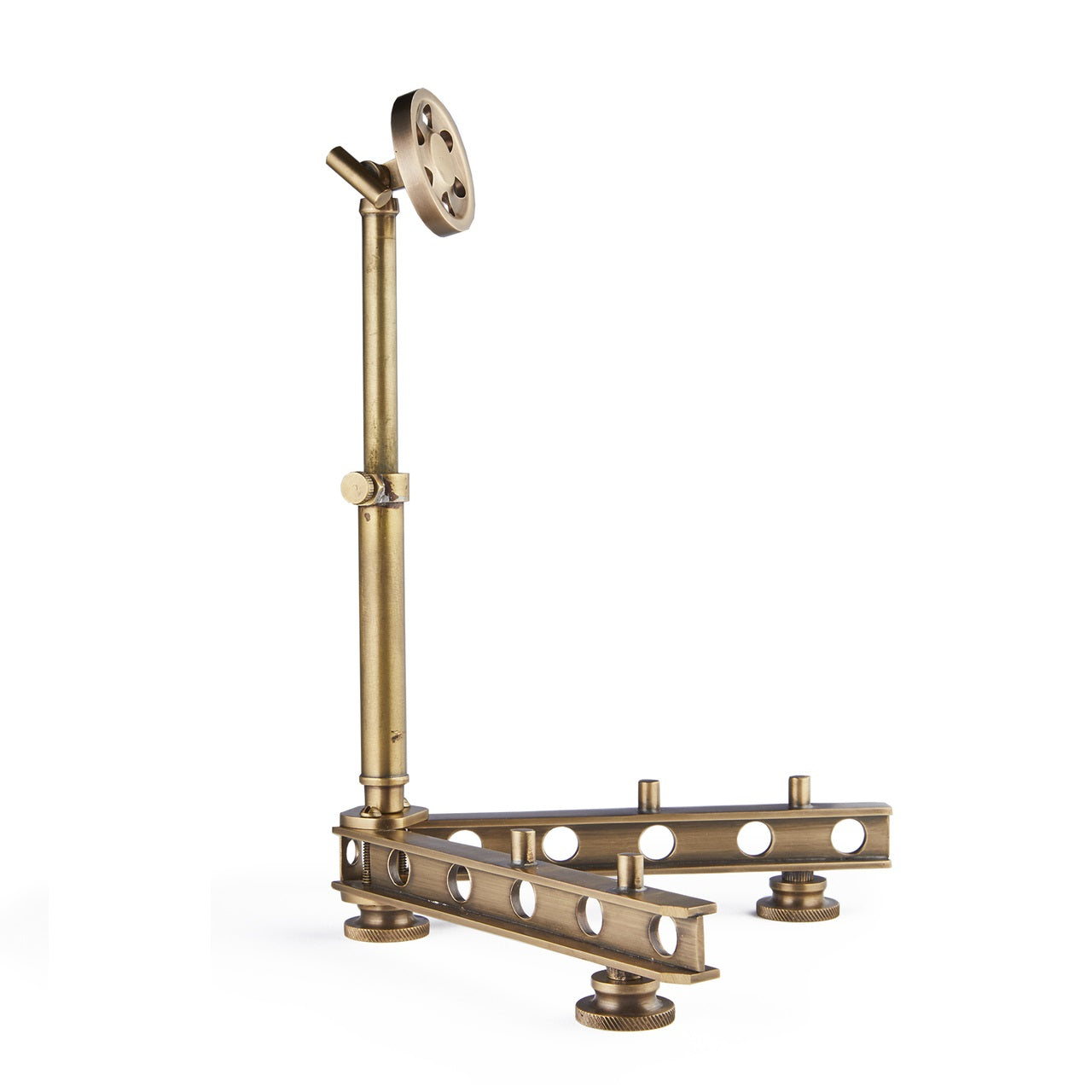 Brass gadget stand on a white background