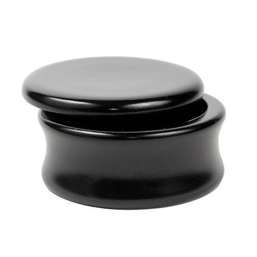 A black mango wood shave bowl.