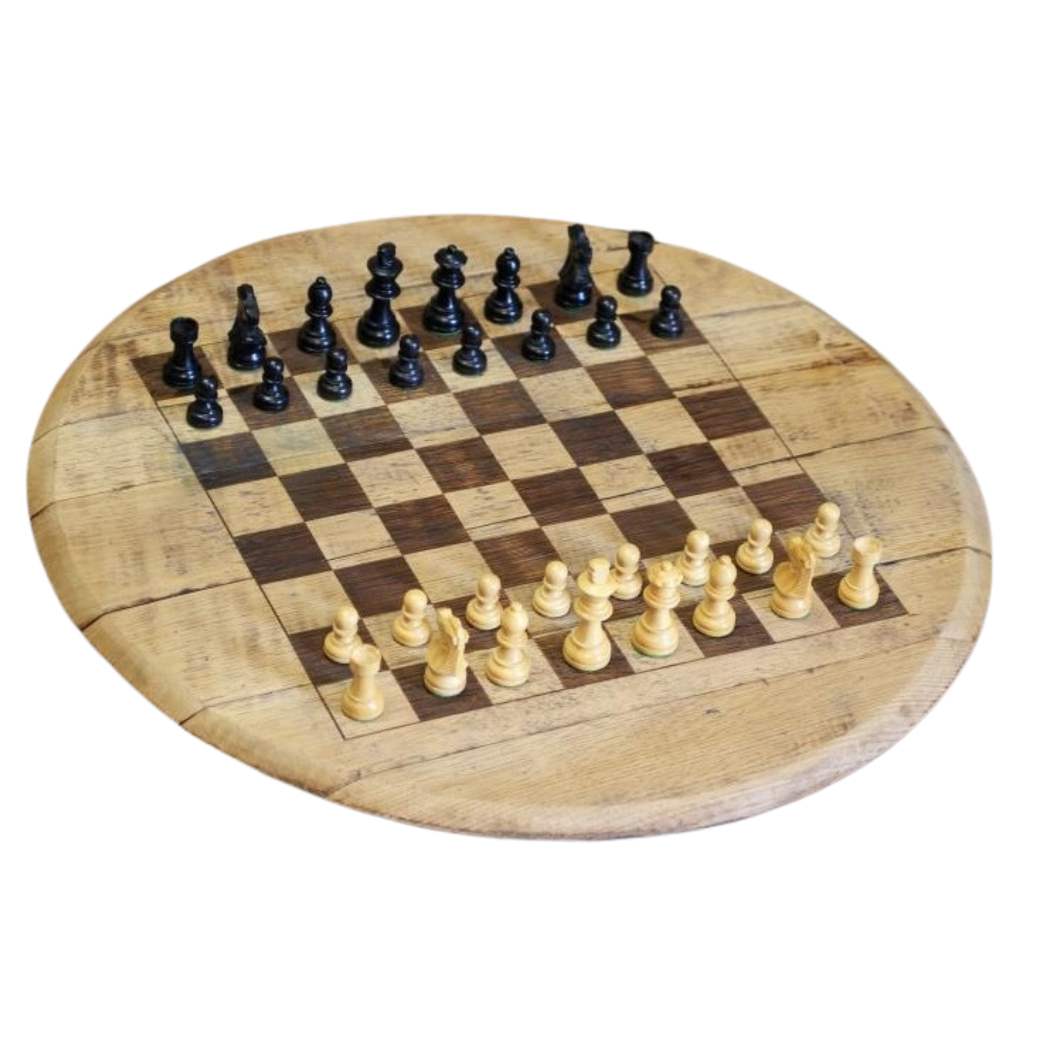 Wooden chessboard with black and white chess pieces on a white background