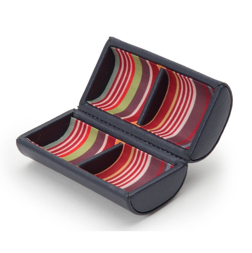 Cylindrical cufflink case with a colorful interior on a white background