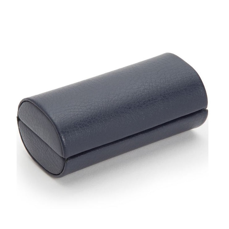 Navy cylindrical cufflink case on a white background