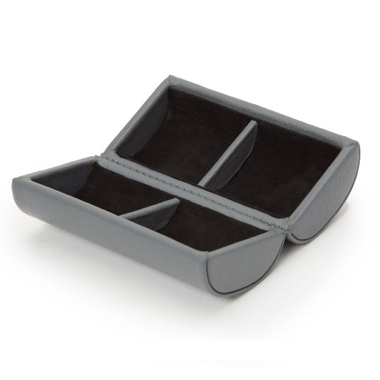 Gray cufflink box with compartments on a white background