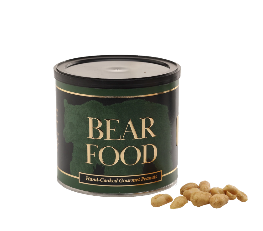 Canister labeled 'Bear Food' with peanuts next to it on a white background