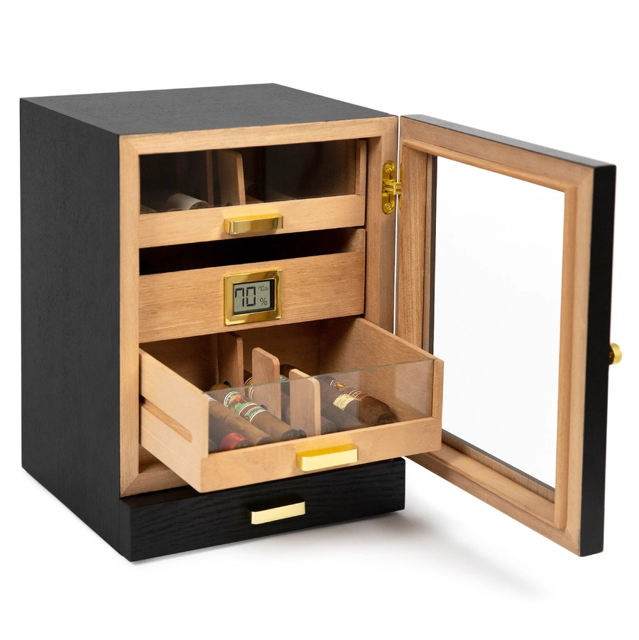 A black ash wood humidor cabinet with gold-plated hardware, featuring a digital display and multiple cigar drawers.