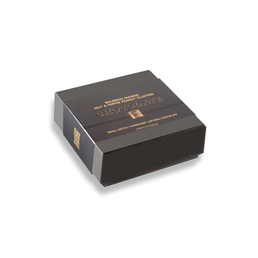 Black chocolate packaging box with gold text on a white background