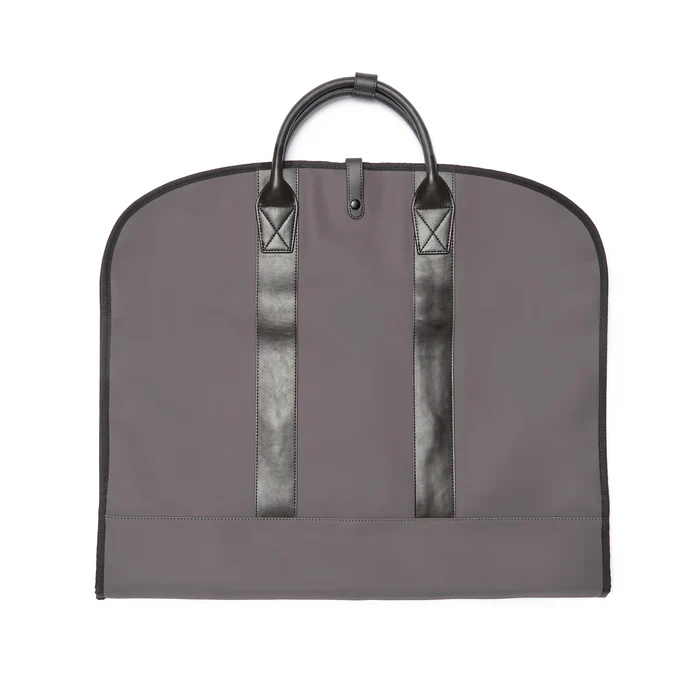 Gray garment bag with black straps on a white background