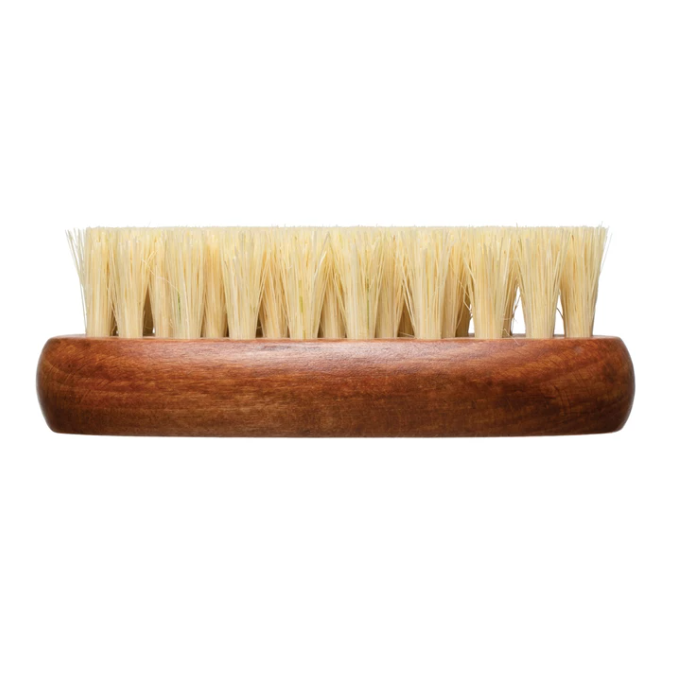 A beech wood brush with dark brown handle and beige bristles