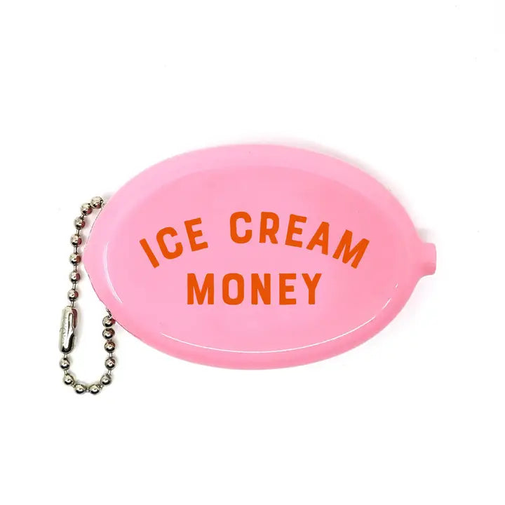 A pink coin pouch with the words "ice cream money" on it in orange.