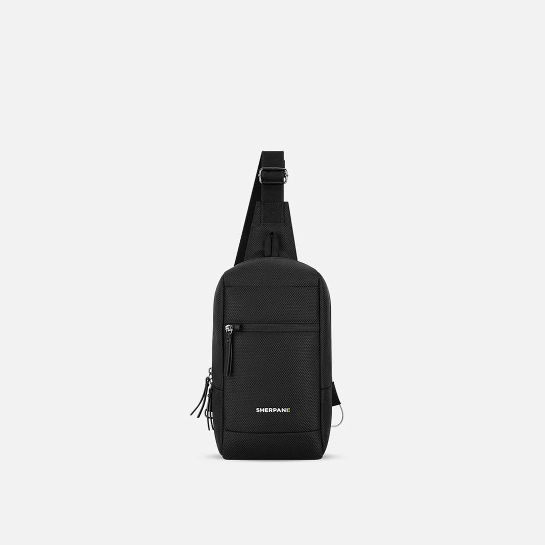 Carbon Black Reversible Travel Sling Bag | Sherpani: