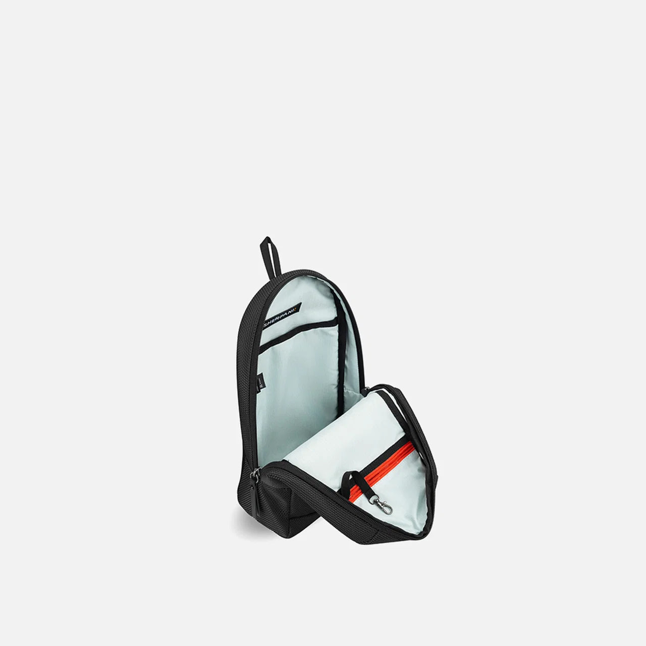 Carbon Black Reversible Travel Sling Bag | Sherpani: