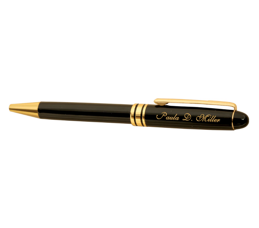 Black pen with gold accents on a white background