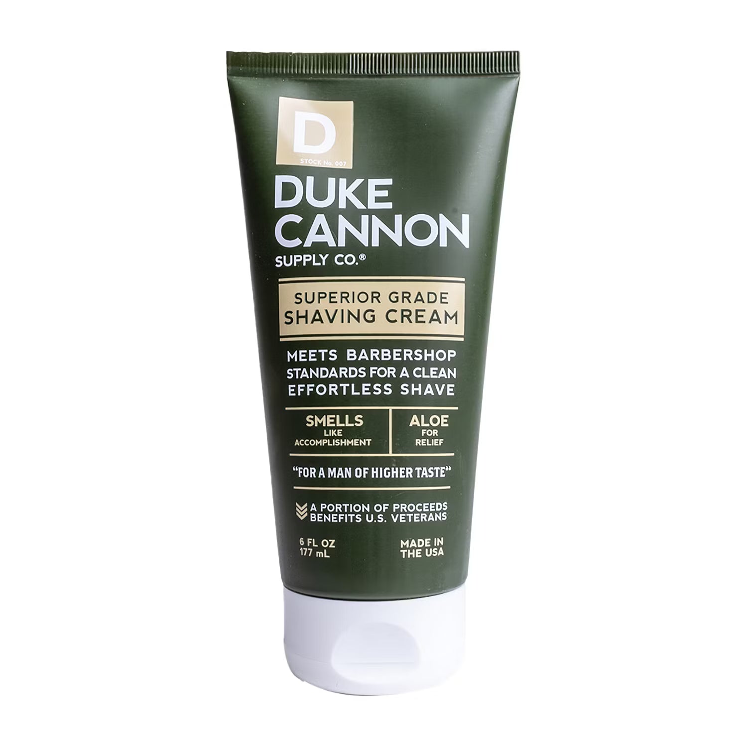 A tube of Duke Cannon Superior Grade Shaving Cream with green and white packaging.