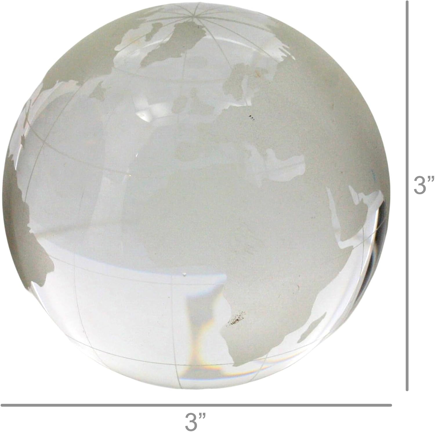 Measurements for a glass etched world globe paperweight on a white surface, showing 3 inches in diameter.