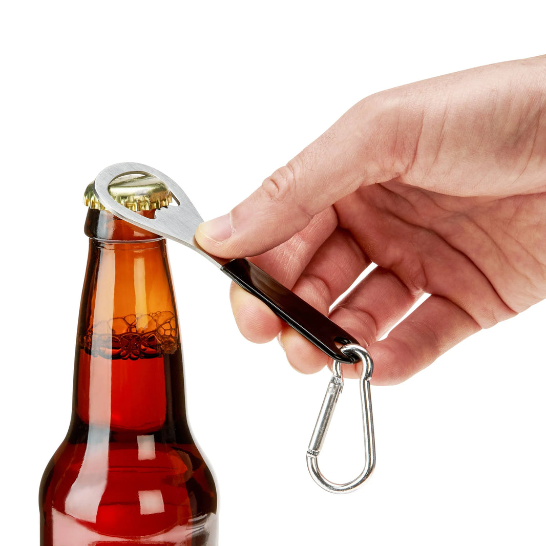 Hand using a bottle opener with a carabiner on a white background