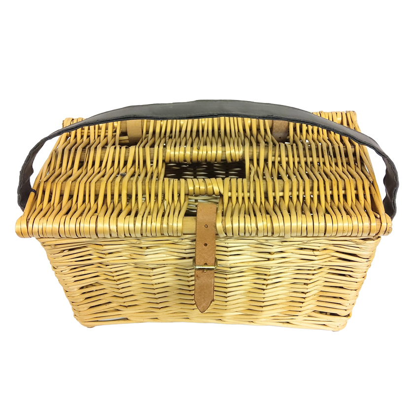 A hand woven fishing basket with leather strap.