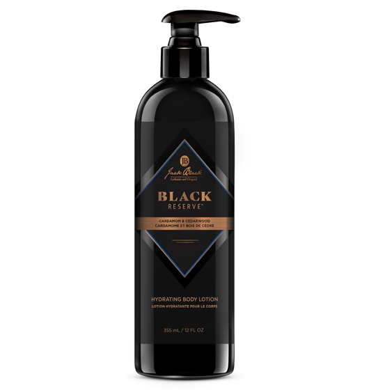 A black bottle of Jack Black Black Reserve Hydrating Body Lotion with a pump dispenser, indicating it is a luxurious, hydrating body lotion with a masculine blend of cardamom and red cedarwood.